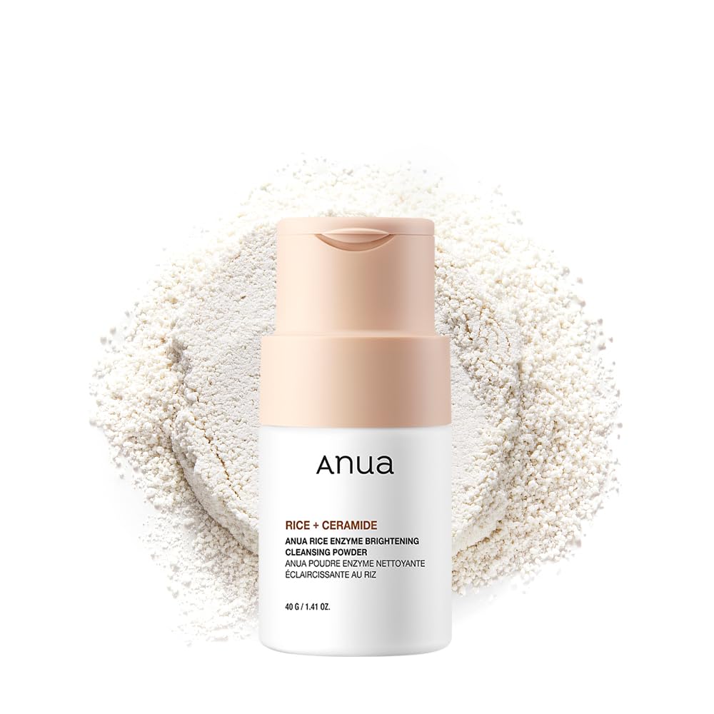 ANUA-Polvere-Detergente-Schiarante-Enzimi-di-Riso-40g ANUA Rice Enzyme Brightening Cleansing Powder 40g bottle with beige cap and white label, rice powder background
